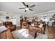 Spacious living area with hardwood floors, opening to kitchen, adjacent to dining room with coffered ceilings at 2853 Mathis Church Rd, Catawba, NC 28609