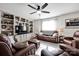 Relaxing living area with stylish furnishings, warm lighting, and decorative built-in display shelving at 2853 Mathis Church Rd, Catawba, NC 28609