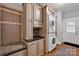 Convenient mudroom features a built-in bench, storage, counter space, and a washer/dryer at 2853 Mathis Church Rd, Catawba, NC 28609