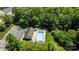 Aerial view of a refreshing community pool with lounge chairs and surrounding green landscape at 3021 Misty Harbor Cir, Cramerton, NC 28032