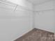 Unfinished walk-in closet features wire shelving at 3021 Misty Harbor Cir, Cramerton, NC 28032