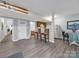 Finished basement featuring a kitchenette, dining area, and unique ski decor for mountain living at 3133 English Sparrow Ln, Charlotte, NC 28210