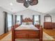 Large primary bedroom with vaulted ceiling, natural light, and traditional decor at 3133 English Sparrow Ln, Charlotte, NC 28210