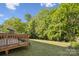 Spacious backyard with a deck and plenty of room for entertaining or relaxing at 3223 Rheinwood Ct, Matthews, NC 28105