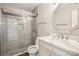 Modern full bathroom with tile shower and granite vanity at 3223 Rheinwood Ct, Matthews, NC 28105