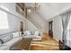 Bright living room with hardwood floors, a grand staircase, and an elegant chandelier at 3223 Rheinwood Ct, Matthews, NC 28105