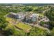 Aerial view of multi-story apartment buildings showcasing colorful exteriors and green space at 397 Luray Way, Rock Hill, SC 29730