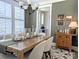 Stylish dining area with modern decor, bright windows, and a glimpse of the kitchen at 397 Luray Way, Rock Hill, SC 29730