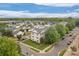 Aerial view showcases the neighborhood's layout, mature trees, and well-maintained homes at 4072 Town Center Rd, Harrisburg, NC 28075