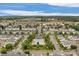 A stunning aerial view of a community with a sparkling pool and beautifully maintained landscaping at 4072 Town Center Rd, Harrisburg, NC 28075