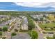 A charming community with well-maintained lawns, tree-lined streets, and attractive residential buildings at 4072 Town Center Rd, Harrisburg, NC 28075