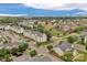 An overview of a community featuring well-kept apartment buildings and meticulously manicured lawns and landscaping at 4072 Town Center Rd, Harrisburg, NC 28075