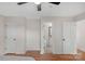 Bedroom with neutral walls and view to bathroom and closets at 4072 Town Center Rd, Harrisburg, NC 28075