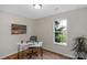 Office space with work desk, artwork and bright window with view of property at 4072 Town Center Rd, Harrisburg, NC 28075