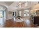 Spacious foyer with hardwood floors, two-story ceiling, and glass-door office at 4117 Wallbrook Dr, Matthews, NC 28105