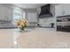 Kitchen island with flowers and countertop details at 4117 Wallbrook Dr, Matthews, NC 28105