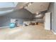 Large, well-lit bonus room offers carpet flooring and ample space for recreation and relaxation at 4117 Wallbrook Dr, Matthews, NC 28105