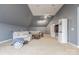 Spacious living area with neutral colors, carpet flooring, and a cozy sectional sofa at 4117 Wallbrook Dr, Matthews, NC 28105