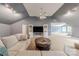 This large, carpeted living room features stylish lighting, perfect for Gathering entertainment at 4117 Wallbrook Dr, Matthews, NC 28105