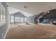 This carpeted bonus room offers an abundance of natural light and ample space at 4117 Wallbrook Dr, Matthews, NC 28105