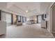 Spacious main bedroom featuring a tray ceiling, neutral color palette, and ample natural light at 4117 Wallbrook Dr, Matthews, NC 28105
