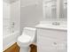 Clean, all white bathroom with modern sink, toilet, and bathtub with shower at 412 Brook St, Salisbury, NC 28146