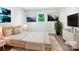 Serene bedroom featuring hardwood floors, neutral tones, and natural light from the window at 412 Brook St, Salisbury, NC 28146