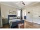 Charming bedroom with hardwood floors, a comfortable bed, and ample natural light at 421 Mcdonald Ave, Charlotte, NC 28203