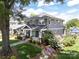 A beautiful two-story home with mature trees, lovely landscaping, and a classic design at 421 Mcdonald Ave, Charlotte, NC 28203
