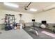 Well-equipped garage gym with exercise bikes, weights, bike rack, and plenty of workout space at 421 Mcdonald Ave, Charlotte, NC 28203