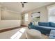 Cozy living room featuring soft carpet, natural light, and comfortable seating at 421 Mcdonald Ave, Charlotte, NC 28203