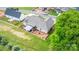 A view of the home's backyard featuring a patio, landscaping, and fenced in yard at 4949 Southview Dr, Hickory, NC 28602