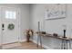 Inviting entryway with a stylish console table, decorative accents, and a charming wreath adorning the front door at 4949 Southview Dr, Hickory, NC 28602