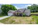 Lovely one-story home with a covered porch, attached two-car garage, and spacious front yard at 4949 Southview Dr, Hickory, NC 28602