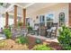 Inviting front porch with stone columns, rocking chairs, and charming decor at 4949 Southview Dr, Hickory, NC 28602