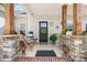 Charming front porch featuring wooden columns and comfortable rocking chairs at 4949 Southview Dr, Hickory, NC 28602