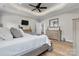 Stylish main bedroom with tray ceilings, a ceiling fan, and luxury vinyl flooring at 4949 Southview Dr, Hickory, NC 28602