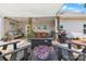 A covered patio featuring a grill, fan, seating and decor creating an ideal outdoor living space at 4949 Southview Dr, Hickory, NC 28602