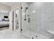 Modern glass shower with marble tile, a rainfall shower head, and seating at 4949 Southview Dr, Hickory, NC 28602