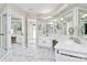 Bathroom with double sinks, vanity, and beautiful marble floors at 5601 Carmel Station Ave, Charlotte, NC 28226