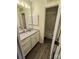 Bathroom featuring granite countertop vanity, neutral paint, and a shower-tub combination at 5601 Carmel Station Ave, Charlotte, NC 28226