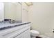 Modern bathroom features a vanity with marble countertop and a toilet at 5601 Carmel Station Ave, Charlotte, NC 28226