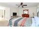 Bedroom featuring a bed, TV, dresser, and ceiling fan at 5601 Carmel Station Ave, Charlotte, NC 28226