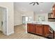 The kitchen is open to the dining and living area with access to the outdoor at 5601 Carmel Station Ave, Charlotte, NC 28226