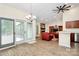 Bright and open living area with sliding glass doors, recessed lighting, and a cozy fireplace at 5601 Carmel Station Ave, Charlotte, NC 28226