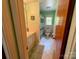 Functional bathroom with tiled walls, vanity, and bath/shower, providing a clean space at 5938 Sharon Rd, Charlotte, NC 28210