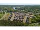 Panoramic aerial view of a community near a lake, highlighting the neighborhood's layout, natural surroundings and prime location at 6642 Star Dr, Sherrills Ford, NC 28673