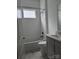 Bathroom featuring a tub and shower combination with grey tiling and sink at 6642 Star Dr, Sherrills Ford, NC 28673