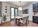 Bright breakfast nook featuring a modern table, chairs, and a large window at 724 Lagan Ct, Fort Mill, SC 29715