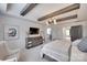 Main bedroom with wood beam details, tv, and neutral decor at 724 Lagan Ct, Fort Mill, SC 29715